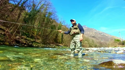 Man Fly-fishing in a river 스톡 동영상 107101151