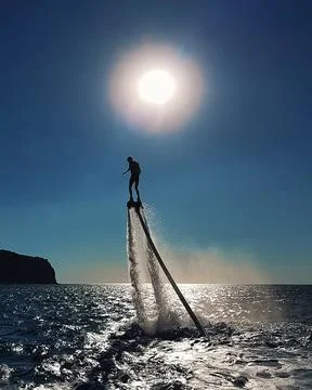 The man on the flyboard. Stock Photos