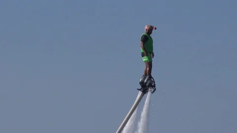 Man Flyboarding Stock Footage 77301285