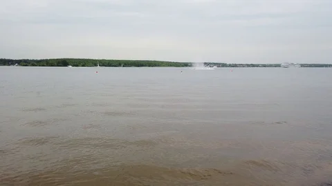 Man on the flying board on the river, water jet spray.Man on the flying board fl Stock-Footage 113421453