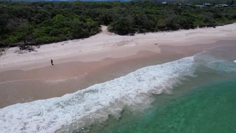Man Flying Drone Camera Over Pottsville Beach In New South Wales, Australia Видео 331303795