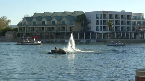 A man flying with a hydro jet pack on - Lake Havasu City Stock Footage 61884451