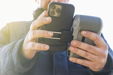 Man flying a modern remote-controlled drone Stock Photos
