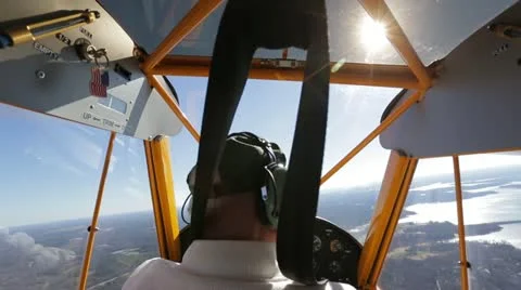 Man flying small plane Stock Footage 22100509