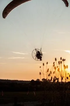 Man flying in sunset Foto stock