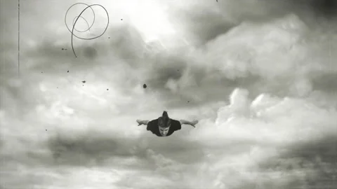 Man Flying Through Clouds In Sky Superhero Concept, Old Film Texture Stock Footage 166165124