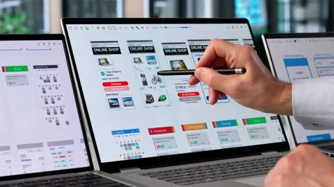 Man Focused On Computer Screen Developing User-friendly App Stock Footage 334931472