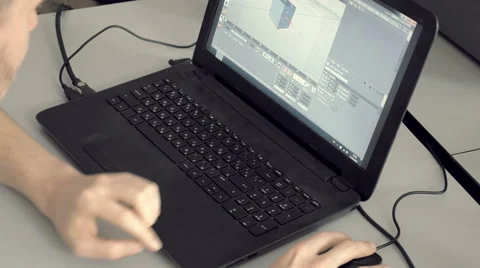 Man is focused on explaining his work on laptop Stock Footage 66717891