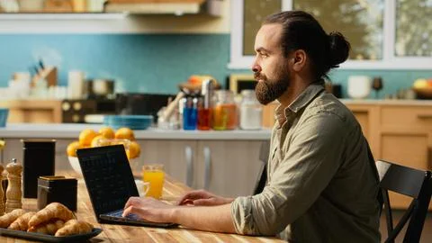 Man focused on programming and software development tasks 스톡 사진