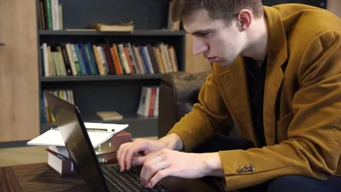 Man focused on working at the computer Stock Footage 155963224