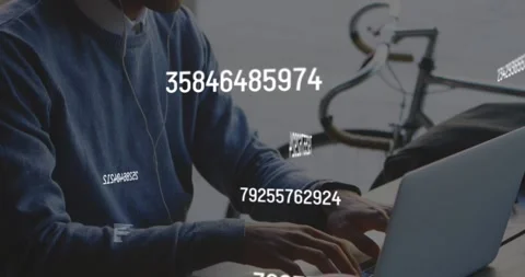 Man focusing on laptop and coding data analysis code swirling numeric streams Stock Footage 328978463