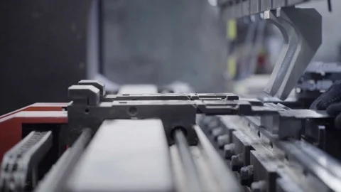 Man fold sheet metal at workshop. Modern tool in heavy industry. Dangerous job Stock Footage 72544793