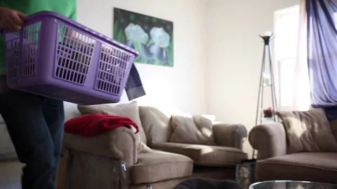 Man Folding Laundry Stock Footage 79427076