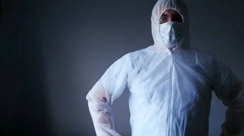 Man in forensic suit folding arms, 4k, UHD Stock Footage 51670904