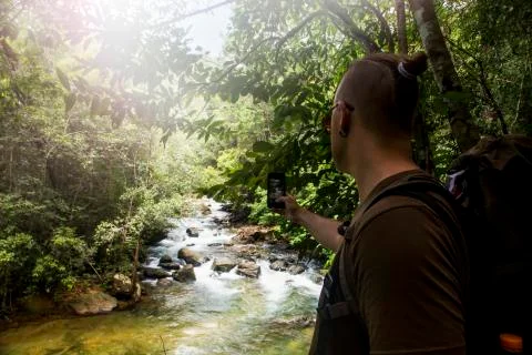 Man in a forest. Stock Photos