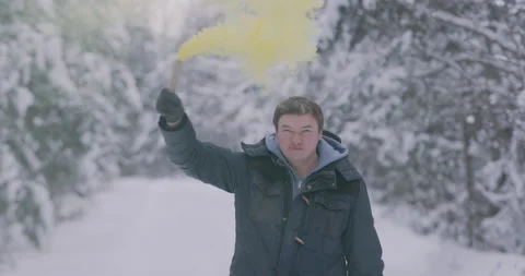 Man in forest with smoke grenade in white clean forest. Stock Footage 147500103