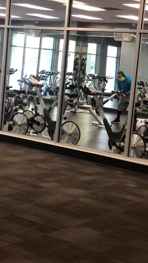 Man Forgets How to Use Exercise Bike, Miami, Florida, USA - 04 Jul 2020 Stock Footage 205161492