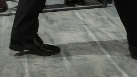 Man in Formal Shoes Walking Through a Modern Interior 스톡 동영상 330514636