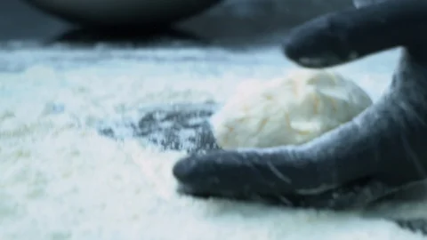 The man forms cheesecake by means of a knife Stock Footage 100549858