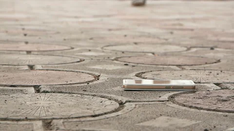 Man found a smartphone on the sidewalk Stock Footage 95807306