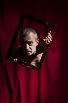 Man in the frame. Stock Photos