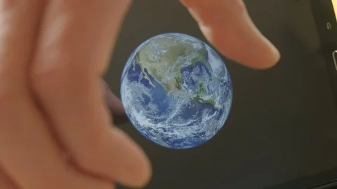A man framing the earth in his hands Video stock 102964966