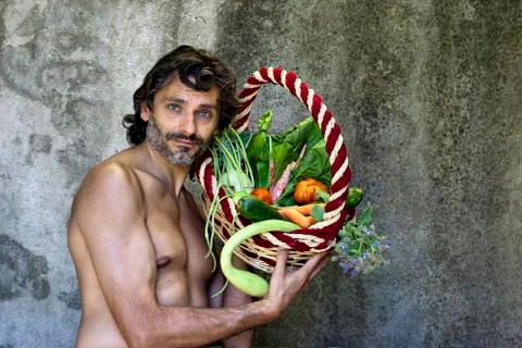 Man with fresh vegetables Stock Photos