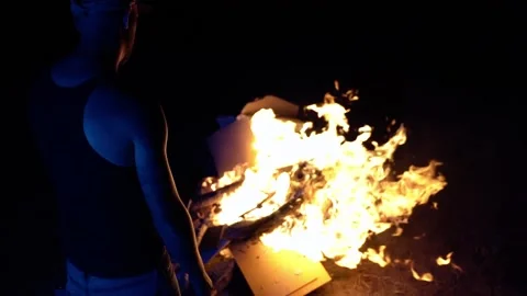 Man in front of fire Video stock 229906689