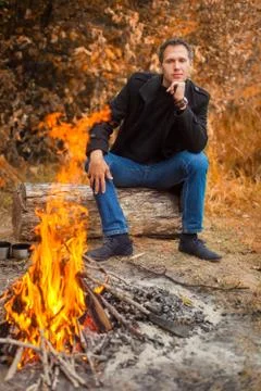 Man in front of fire 스톡 사진