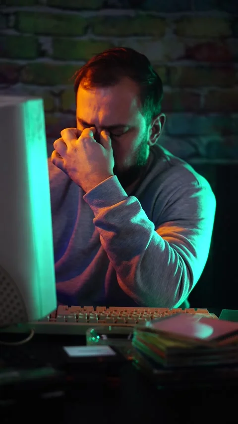 Man in Front of Glitching Cathode Monitor Screen of Desktop Computer From Stock Footage 301881553