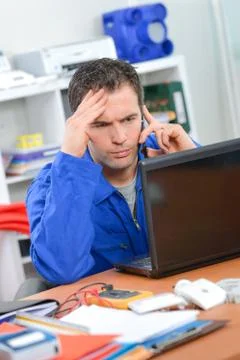 Man in front of a laptop Stock Photos