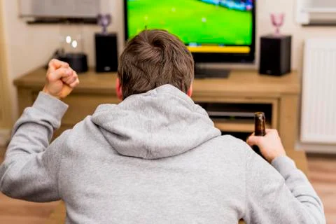 Man in front of tv Stock Photos