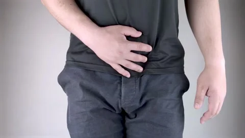 Man front view. Pain in the groin and bladder. The concept of pain in men as a r Stock Footage 130247727