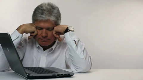MAN FRUSTRATED WITH COMPUTER AT WORK Stock Footage 35349938
