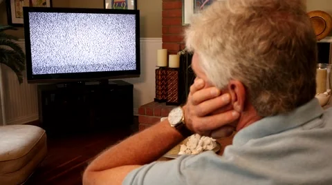 Man Frustrated With Static on TV 4K Stock Footage 40449101