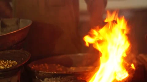 Man frying corns 스톡 동영상 50141787