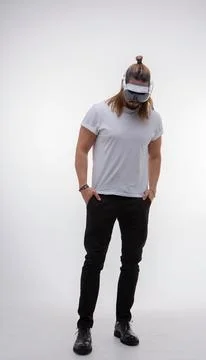 A man fully engaged in a spatial computing experience with a AR headset Fotos Stock