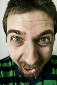 Man with funny face screaming Stock Photos