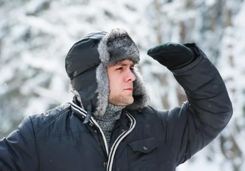 Man in a fur winter hat Fotos de archivo