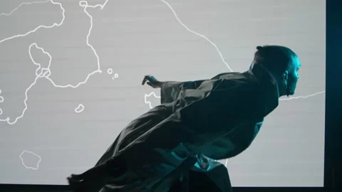 A man from the future interacts and dances against the background, of an LED Vidéo 171232490