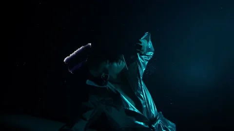 A man from the future interacts and dances against the background, of an LED Stock-Footage 171232590