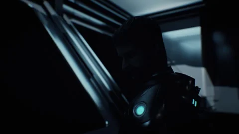 Man in a future space suit walking in a space ship towards a window Stock-Footage 240365047