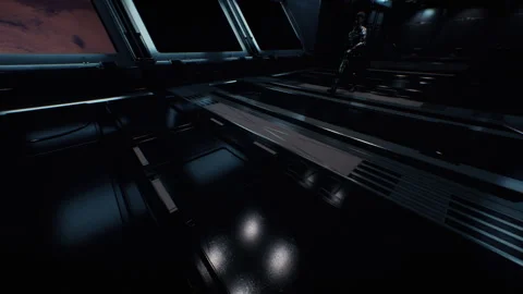 Man in a future space suit walking in a space ship towards the control room Stock-Footage 240367894