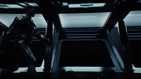 Man in a future space suit walking down a corridor Stock-Footage 240369758