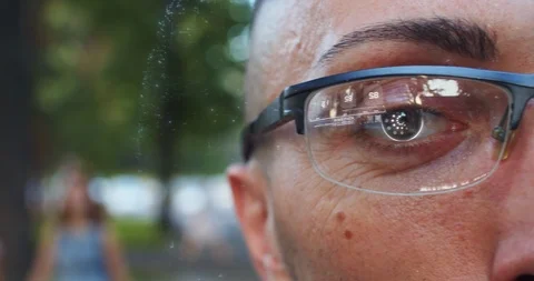 Man in Future Technology Glasses is Browsing News on Digital Interface Stock Footage 122472760