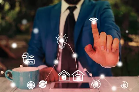 Man In Futuristic Infographics Interface Elements On Blurred Using Free Wi Fi Stock Photos