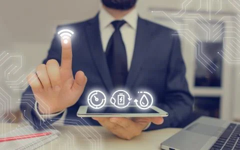 Man In Futuristic Infographics Interface Elements On Blurred Using Free Wi Fi Stock Photos