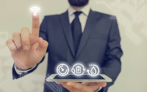 Man In Futuristic Infographics Interface Elements On Blurred Using Free Wi Fi Foto stock