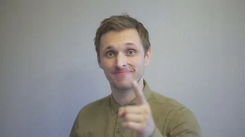 The man gaily winks at the camera Vidéo 78579768