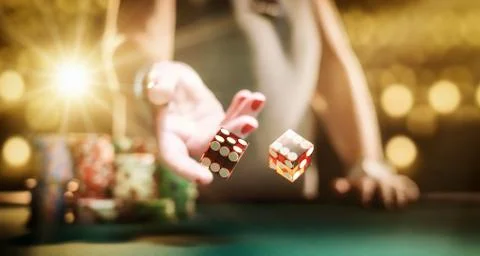 Man gambling at the craps table Stock Photos